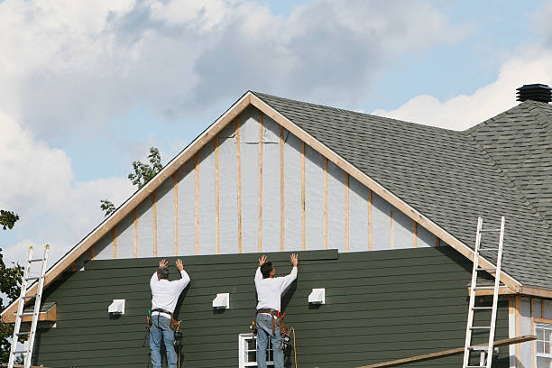 Professional Siding Installation technician working in Greenville, NY